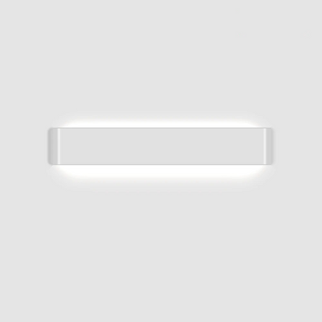 White linear wall sconce photographed alone on a grey ground