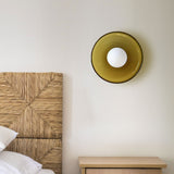 Brown glass disc wall light mounted flat