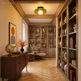 Olive disc ceiling light in a warm wood library
