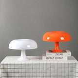 Retro mushroom table lamp shown against a plain background