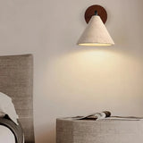 Natural stone wall sconce with round wood backplate detail