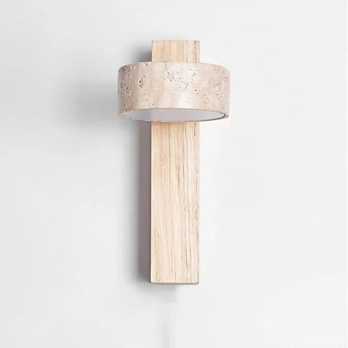 Alternate view of the natural wood travertine wall sconce against a wall