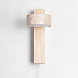 Alternate view of the natural wood travertine wall sconce against a wall