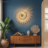 Nautilus shell wall light in a blue living room with plants