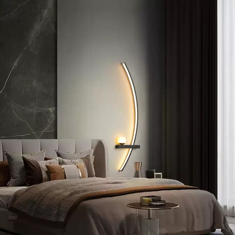 Arc LED wall light providing a low warm glow at night