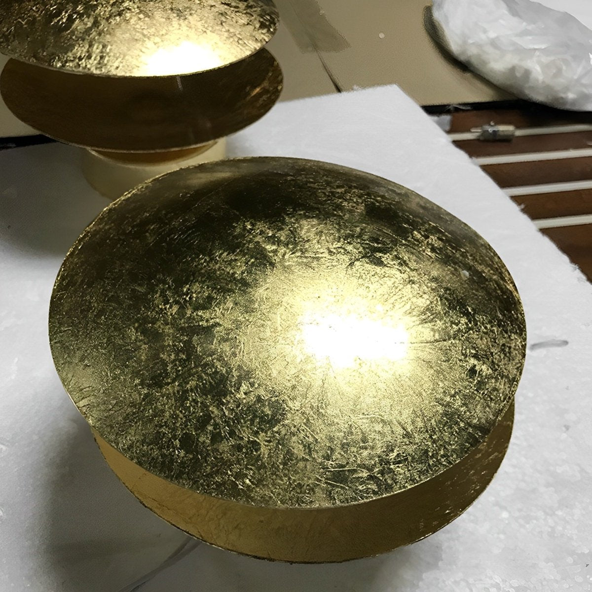 Moon disc modern wall sconce detail view 7 showing finish and construction