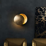 Moon disc modern wall sconce detail view 3 showing finish and construction