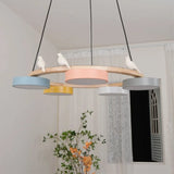 Pastel bird chandelier suited to a nursery or kids room with soft warm light