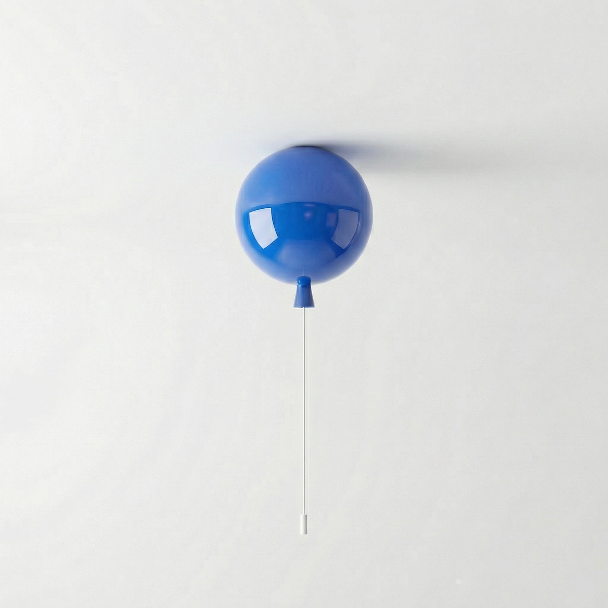 Blue balloon light fitted to a ceiling with a white pull cord