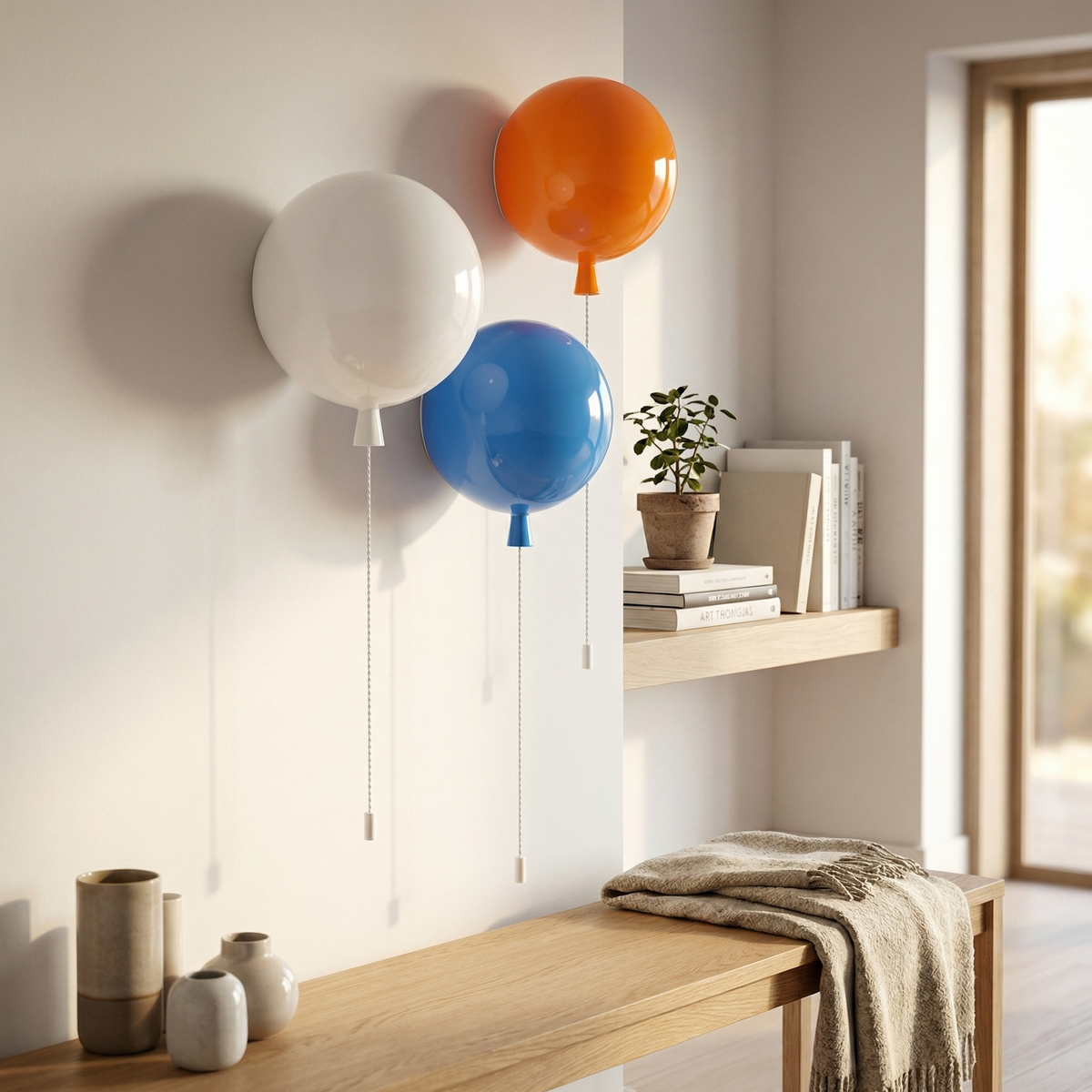 Balloon lights in four colours above a bench and open shelf