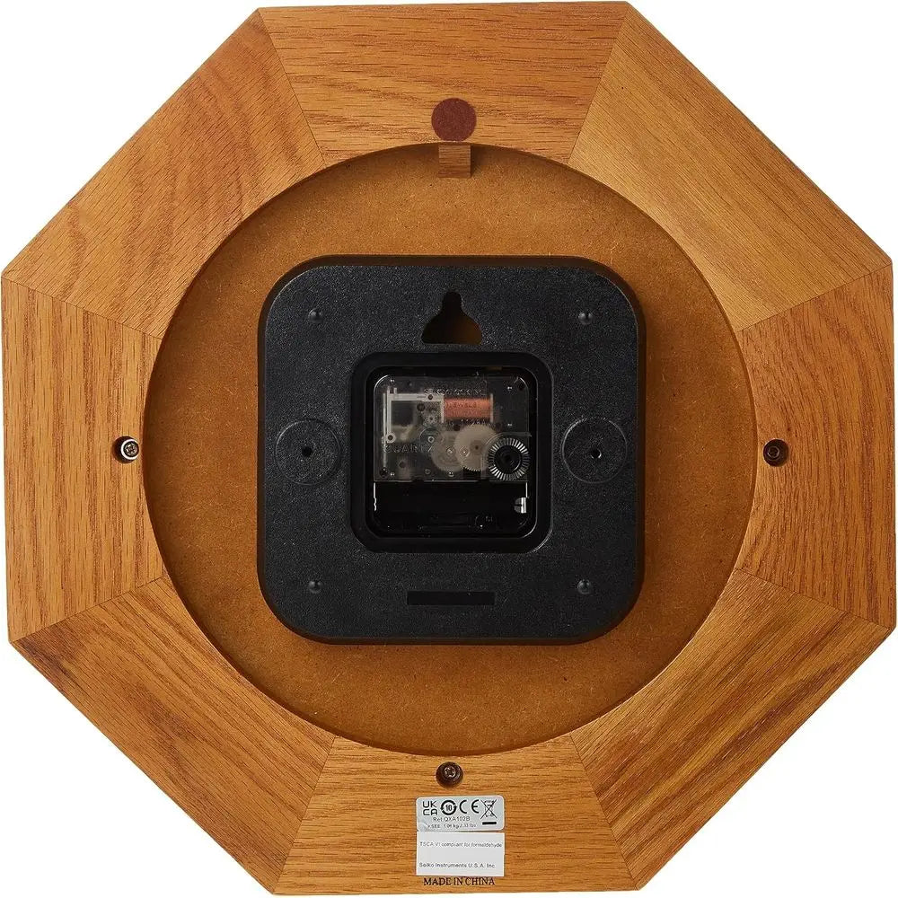 Analog Wall Clock – Seiko Traditional Octagonal Oak Design with Gold Bezel.