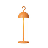 Orange cordless dome table lamp with curved hook top on a slim metal stem