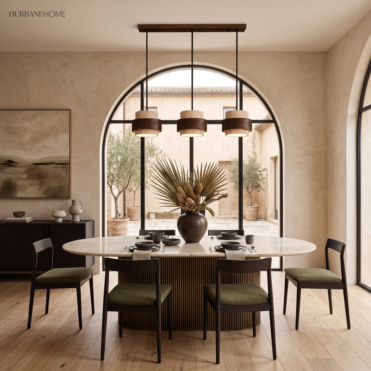 Three-head travertine pendant light over a round dining table