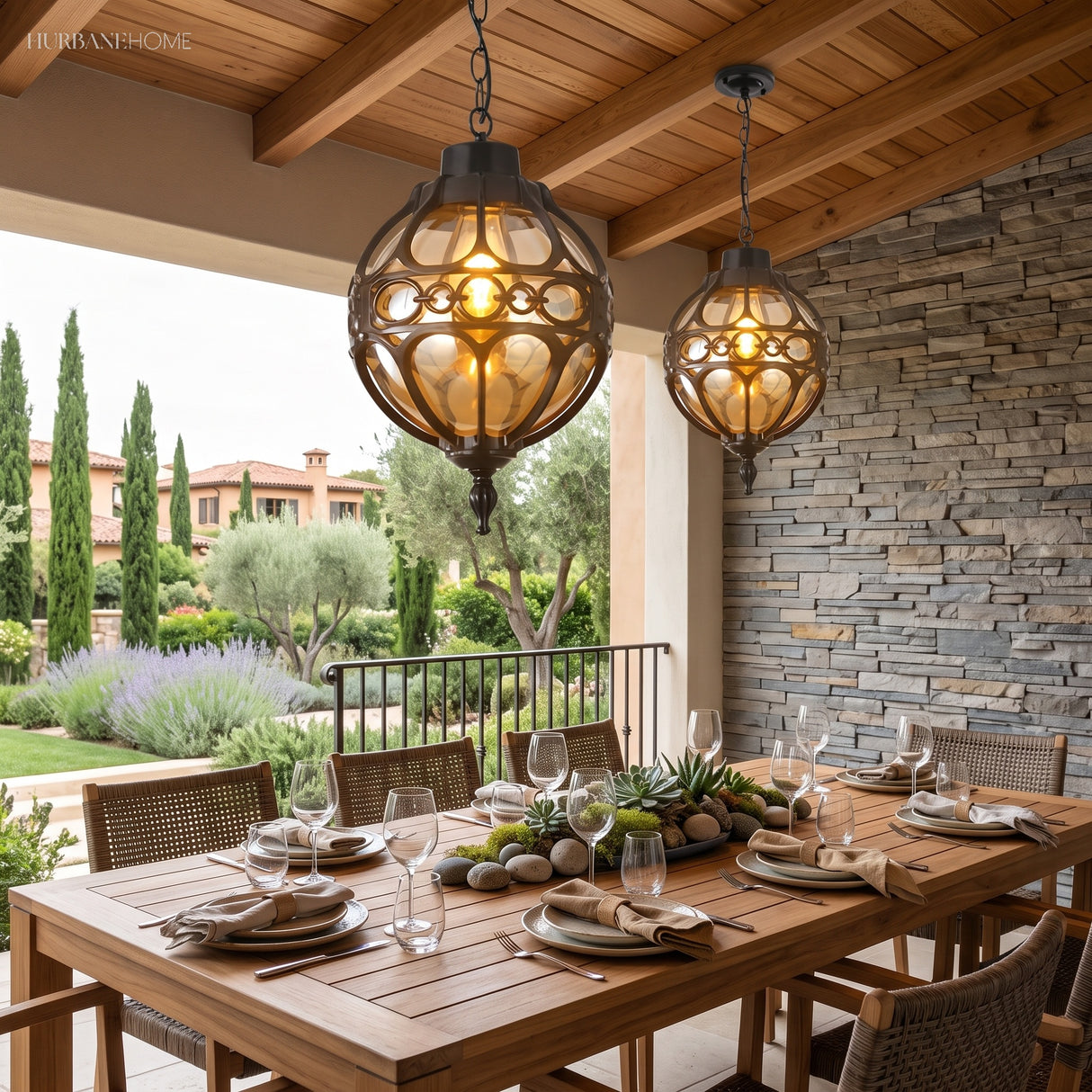 Caged amber globe pendant hanging over a stone patio seating area