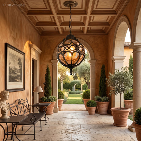 Two caged pendants lighting a covered terrace with timber ceiling