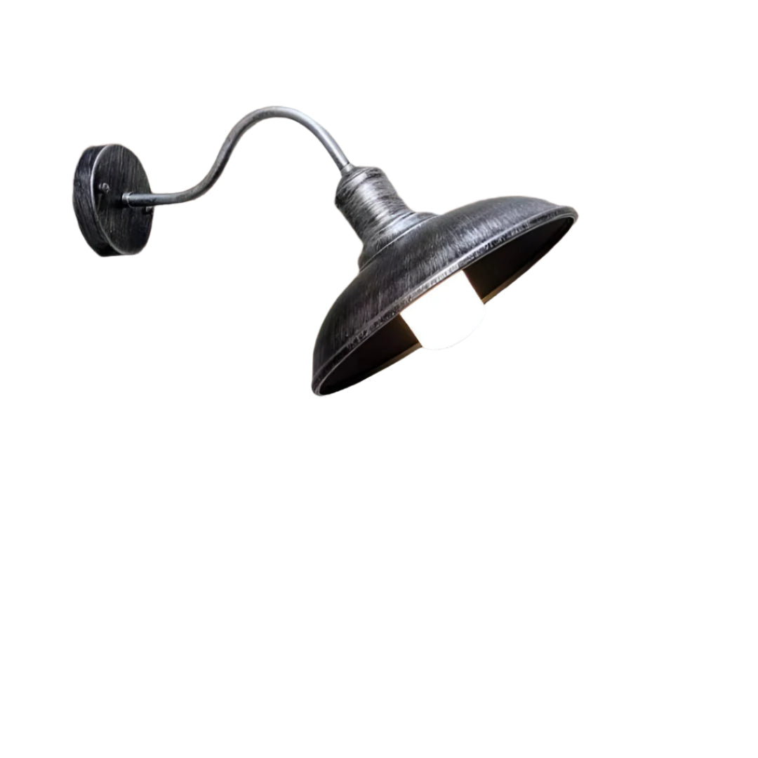 Antique silver gooseneck barn light alone on a white ground