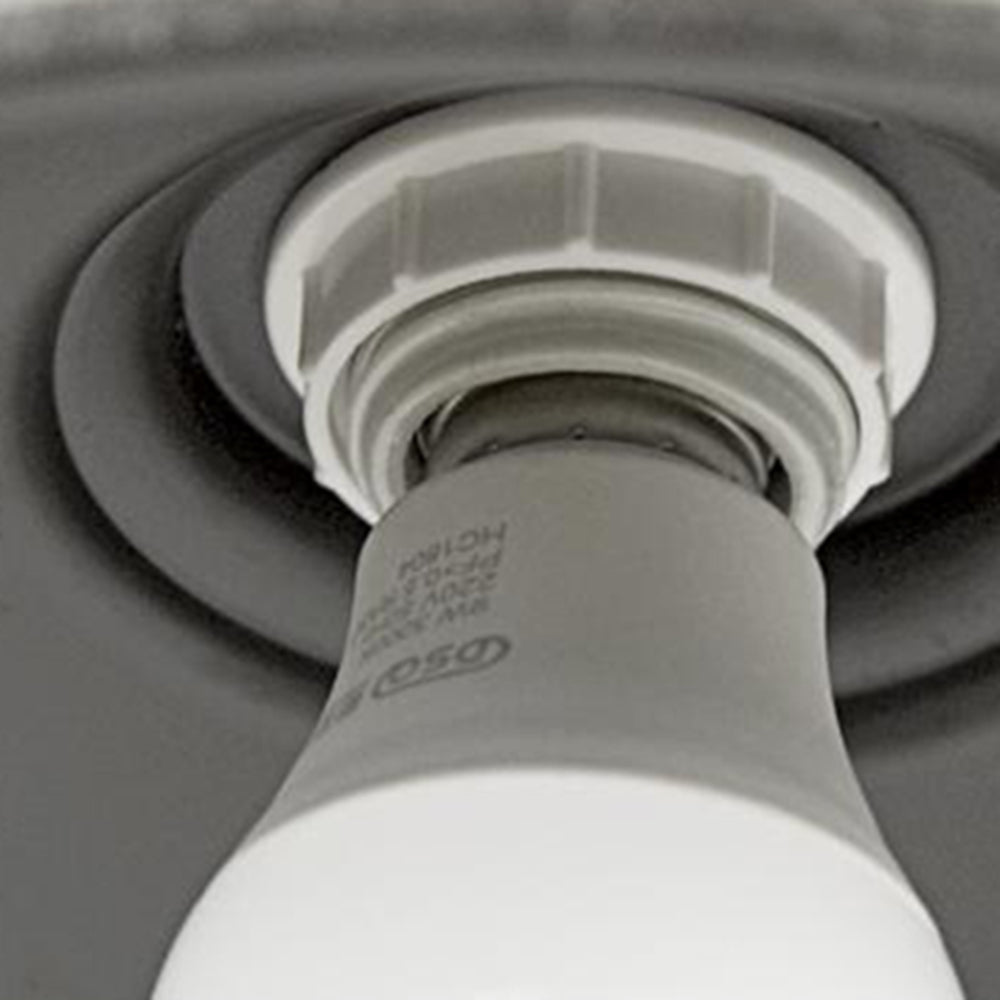Close view of the lamp holder and screw base inside the shade