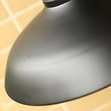 Close view of the curved shade edge under warm light