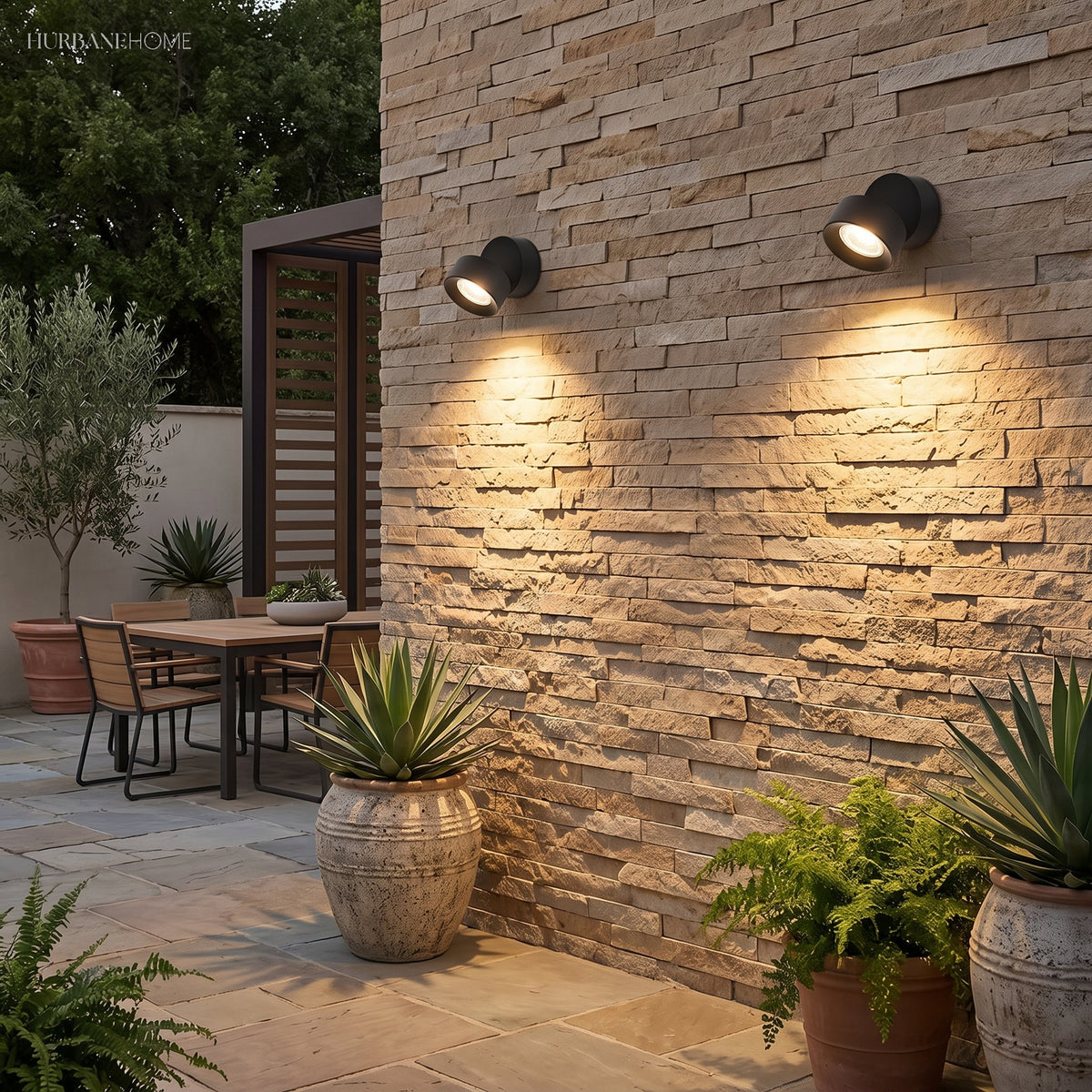 Adjustable spot lighting a stone staircase and planting at night
