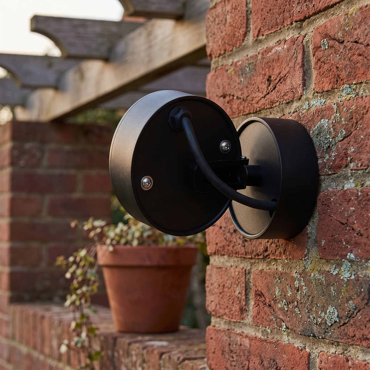 Round adjustable outdoor wall spot main product image on a plain background