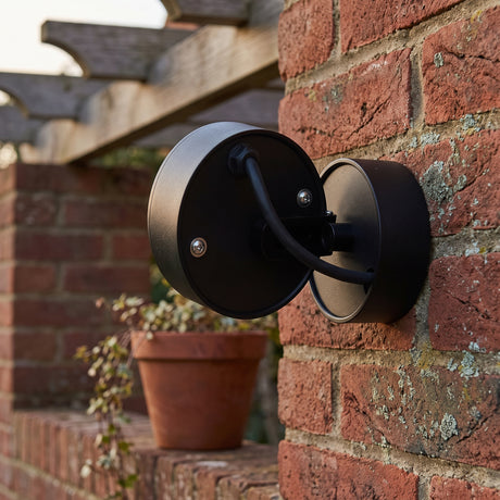 Round adjustable outdoor wall spot main product image on a plain background