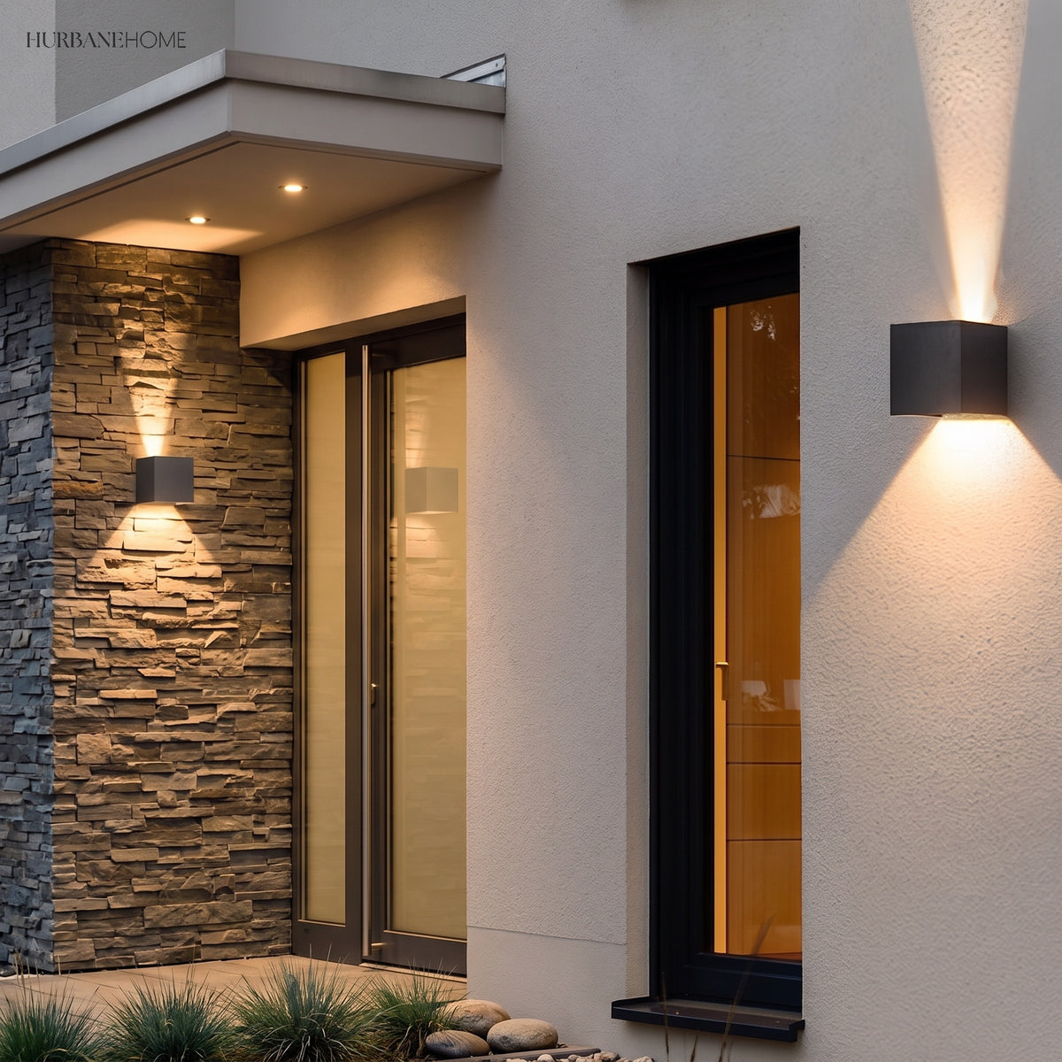 Cube sconce lighting a timber clad wall beside a doorway