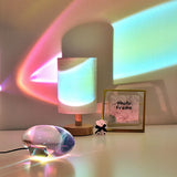 Oval glass mood lamp lit showing warm internal LED glow