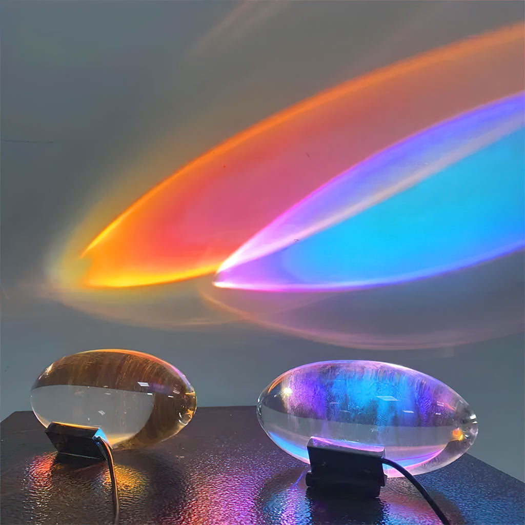 Front view of clear oval glass table lamp with metal base