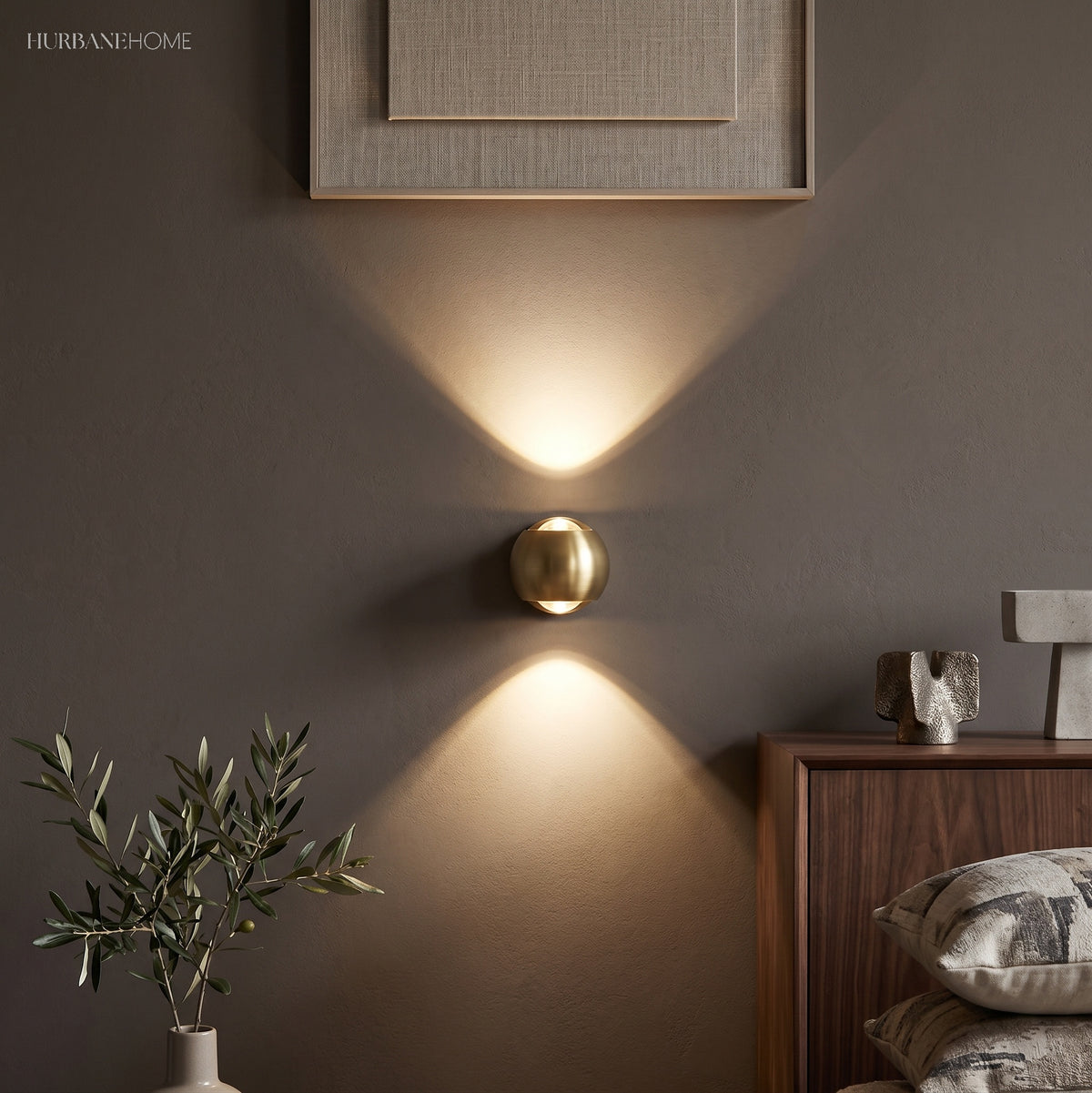 Modern Brass Wall Lamp Jorid Copper LED styled in a room setting
