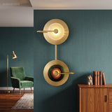 Modern Nordic Wall Sconce Elvira Brass styled in a room setting