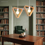 Modern Geometric Pendant Light Asta Wood 1-Light styled in a room setting