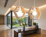 Modern Geometric Pendant Light Asta Wood 1-Light styled in a room setting