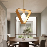 Modern Geometric Pendant Light Asta Wood 1-Light styled in a room setting