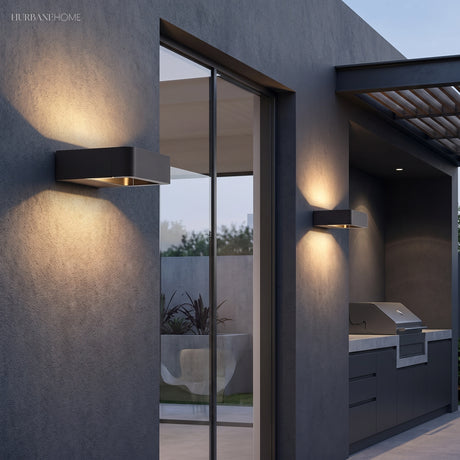 Modern Nico Wall Sconce LED styled in a room setting