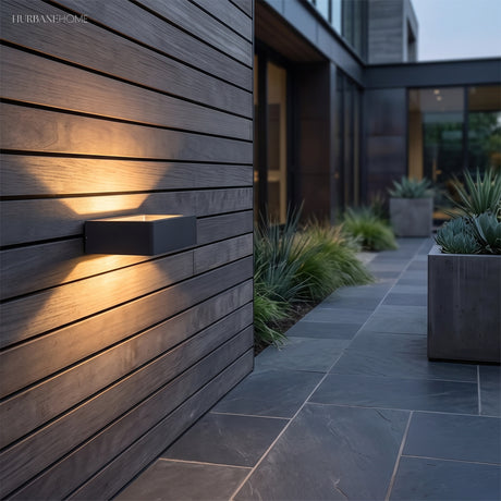 Modern Nico Wall Sconce LED styled in a room setting