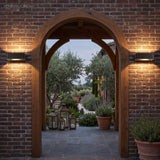 Modern Nico Wall Sconce LED styled in a room setting