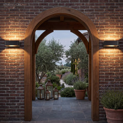 Modern Nico Wall Sconce LED styled in a room setting