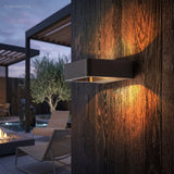Modern Nico Wall Sconce LED styled in a room setting