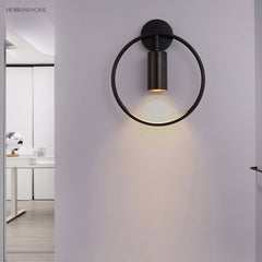 Modern Rotated Wall Sconce Ada LED 1-Light styled in a room setting