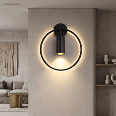 Modern Rotated Wall Sconce Ada LED 1-Light styled in a room setting