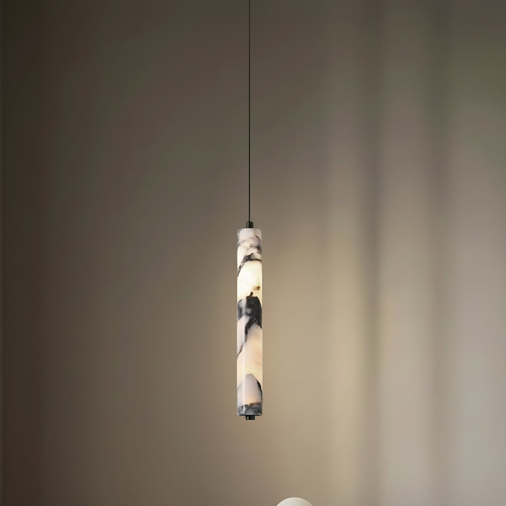 Pendant lamp wire installed above a dining table