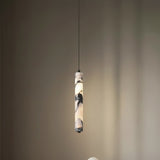 Pendant lamp wire installed above a dining table