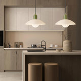 Green bodied pendant light with wide disc shade and glass globe
