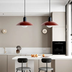Close view of pendant light shade edge and warm glass globe light