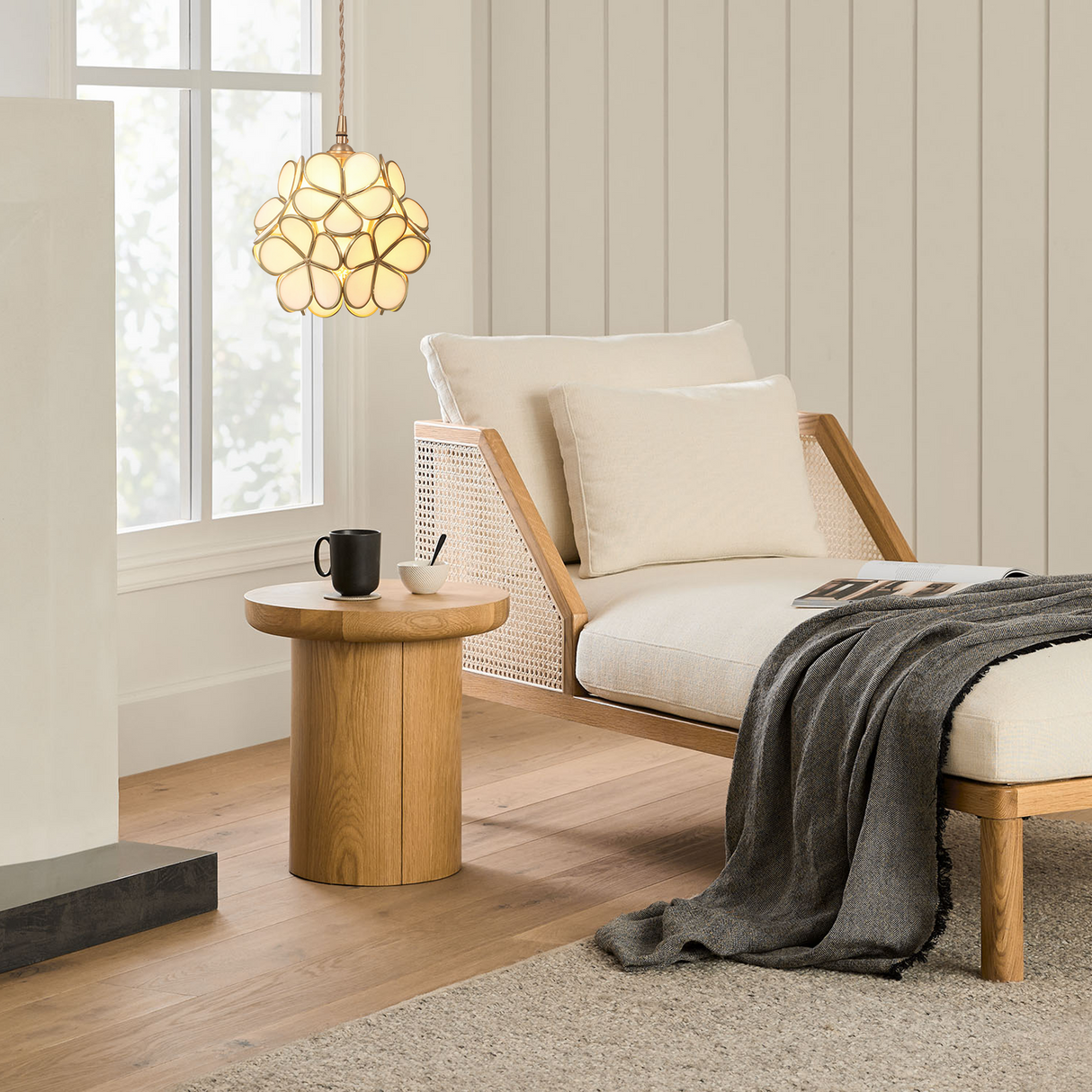 Side profile of the spherical petal glass pendant light with brass frame