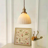 Ceramic pendant with deep pleats and a twisted fabric cord, view 8