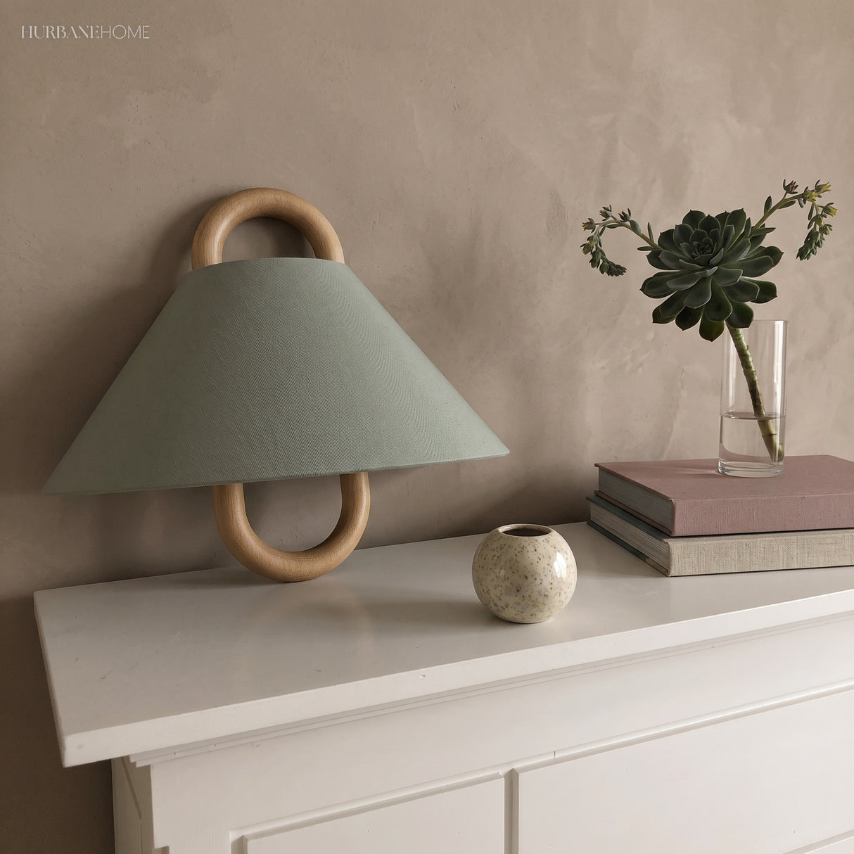 Half-round fabric shade wall sconce lighting a styled corner