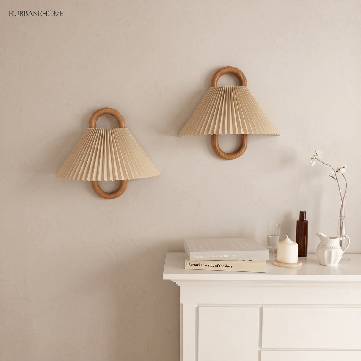 Fabric shade wall sconce styled in a calm modern room
