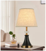 Pleated table lamp with brass base, detail view one