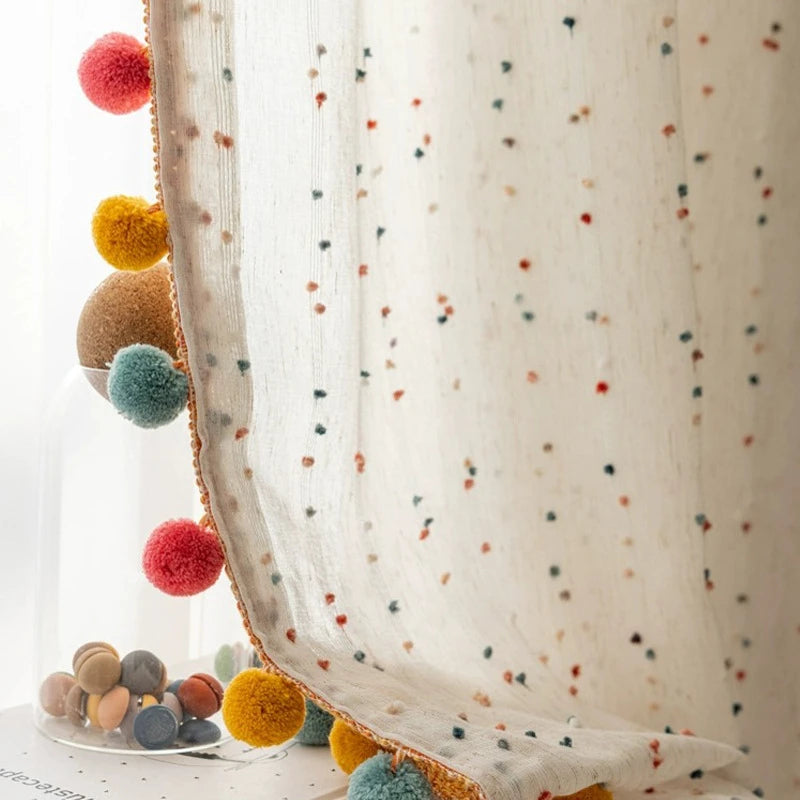 Colorful pom pom curtains for bedroom windows